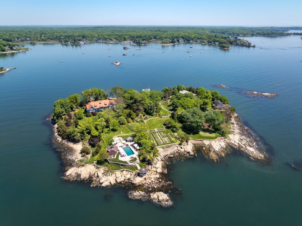 A Bridgewater exec is still trying to sell his private island. He cut its price — and threw in a mainland house with a dock.