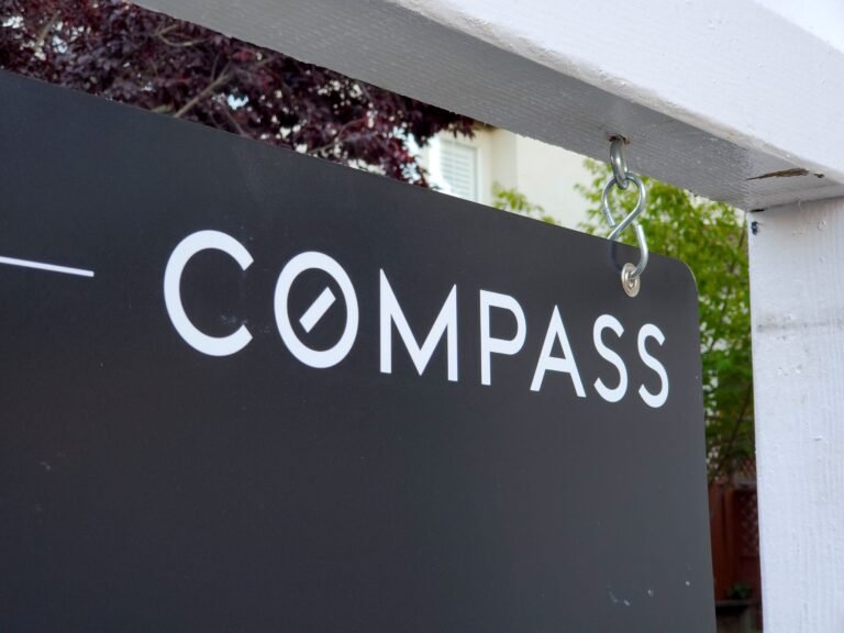 The fight over real estate listings heats up as Compass targets 'Zillow ban' in new lawsuit