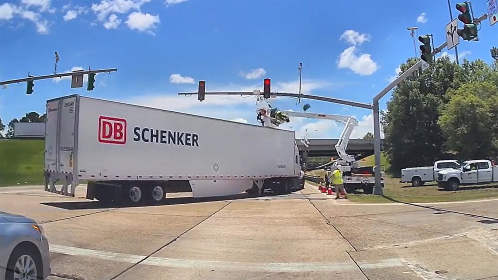 18-Wheeler Hits A Man In A Bucket 30 Feet In The Air