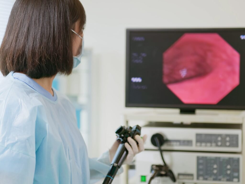 I had the most common symptom of colon cancer in my early 30s. Here's why I got a (pricey) colonoscopy over a stool test.