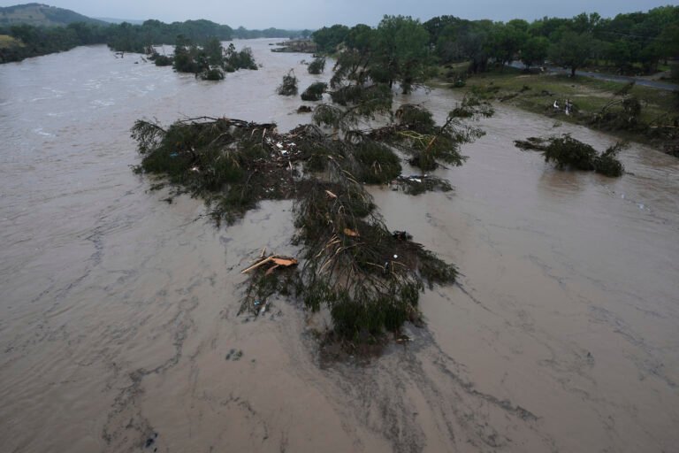 At least 27 people are dead in Texas floods as the search continues for the many missing