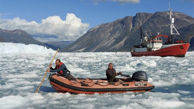 A Fiber-Optic Cable Eavesdrops on a Calving Glacier