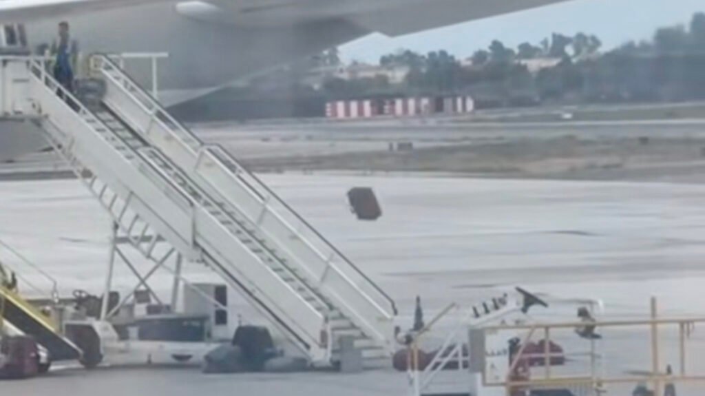 Don't Automatically Freak Out If You See A Worker Just Yeeting Things Out Of A Plane