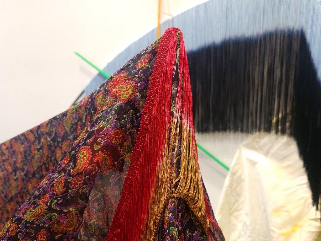 A Textile Show Ruptures, Cascades, and Bleeds 