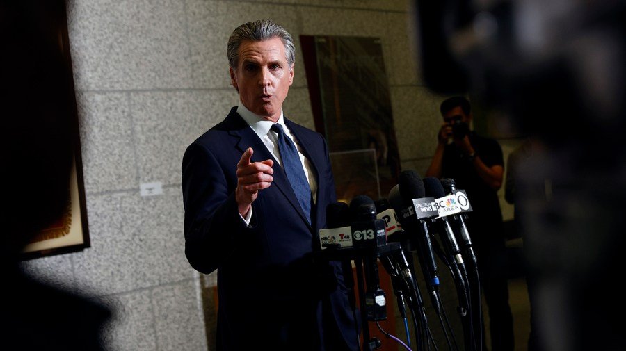 Trump admin sues to block California’s ICE mask ban