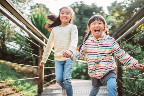 Are Second Kids Really Wilder? Here's What A Psychologist Says