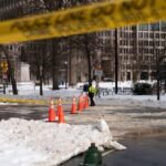 DC crews pile snow at RFK Stadium site as city slowly digs out of storm