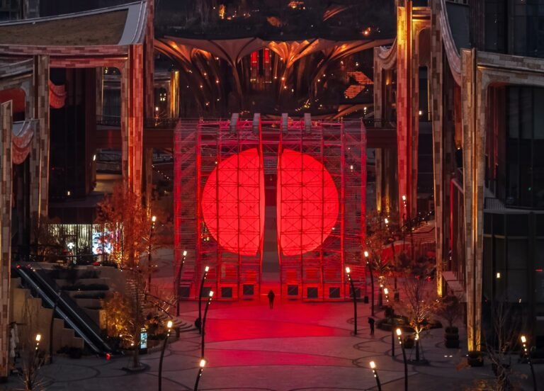A Monumental Bisected Orb by SpY Glows Amid Scaffolding in Xi’an