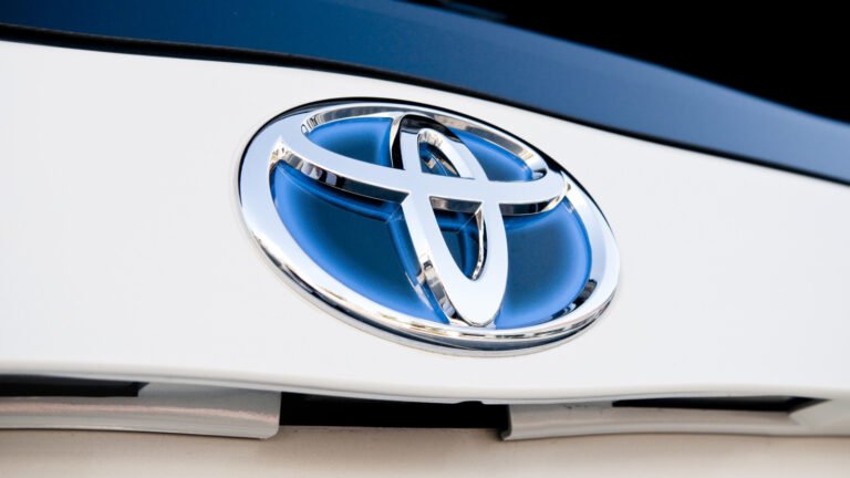 Why Toyota Ditched The Blue Badges For Its Hybrids