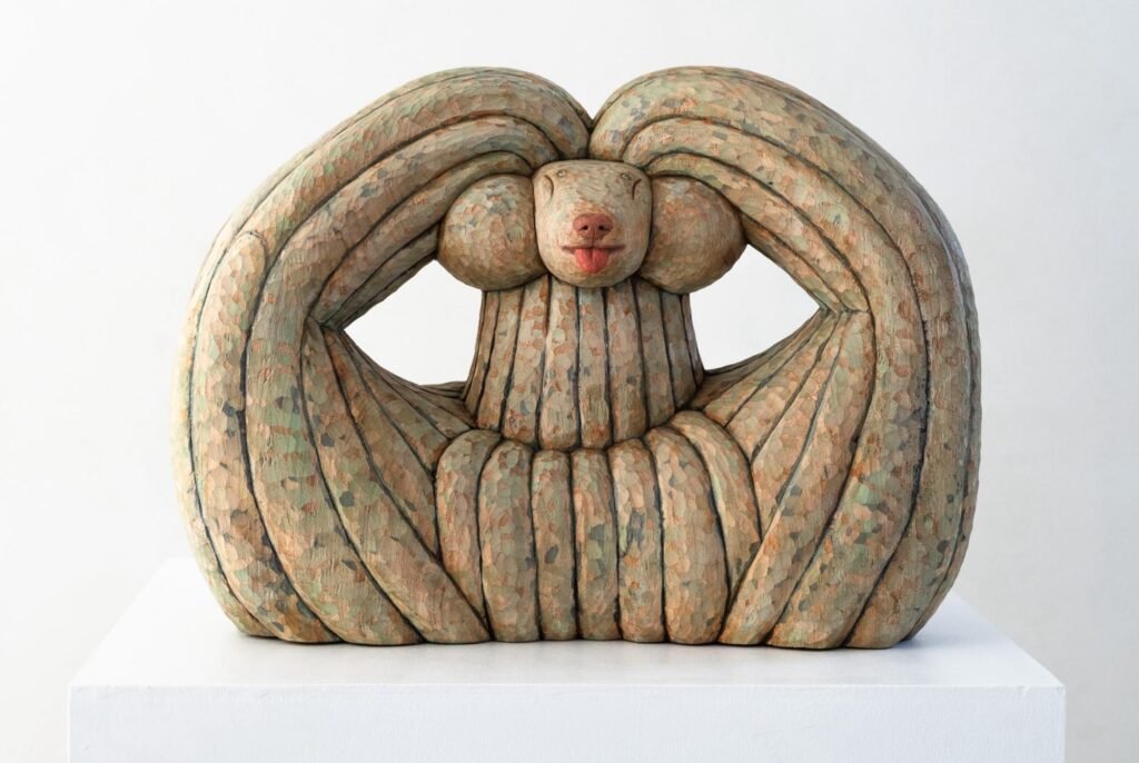 Misato Sano’s Charming Wooden Dogs Are Carved With Personality