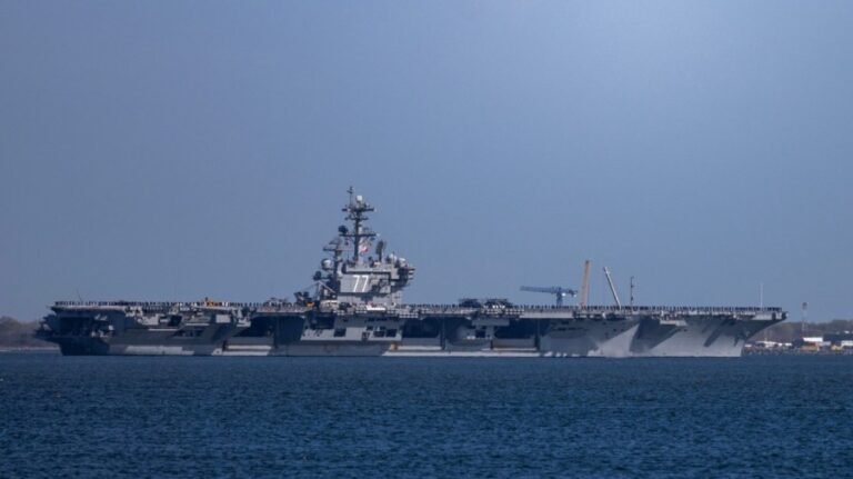 Thousands more US troops headed to Middle East aboard aircraft carrier