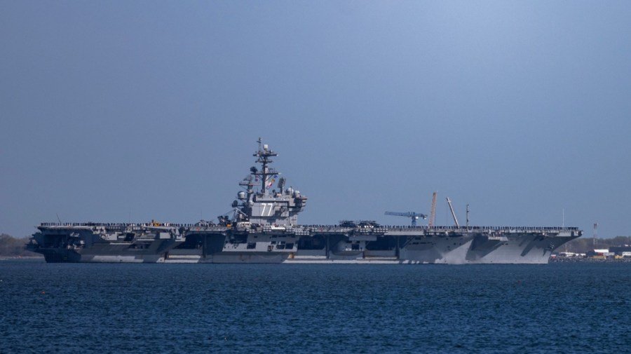 Thousands more US troops headed to Middle East aboard aircraft carrier