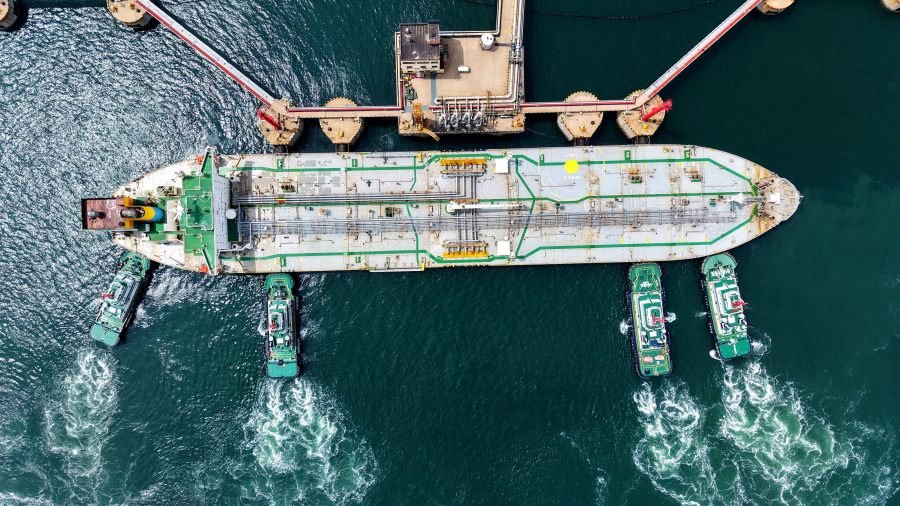 Oil prices dip amid reports of tentative deal
