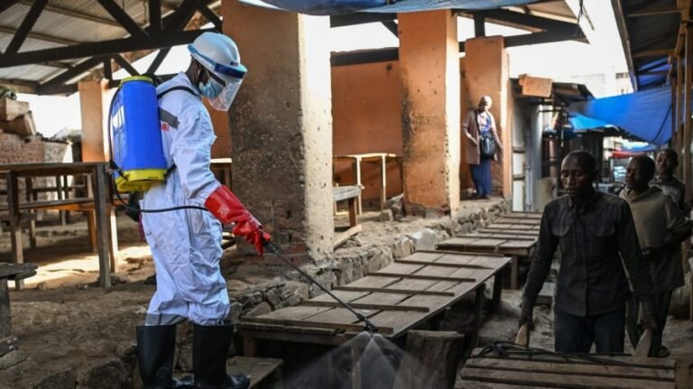 American doctor battling Ebola is weak but stable, officials say