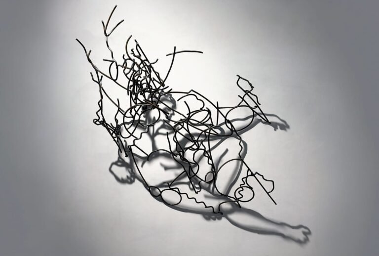 Steel And Shadows Converge in “Larry Kagan: Men”