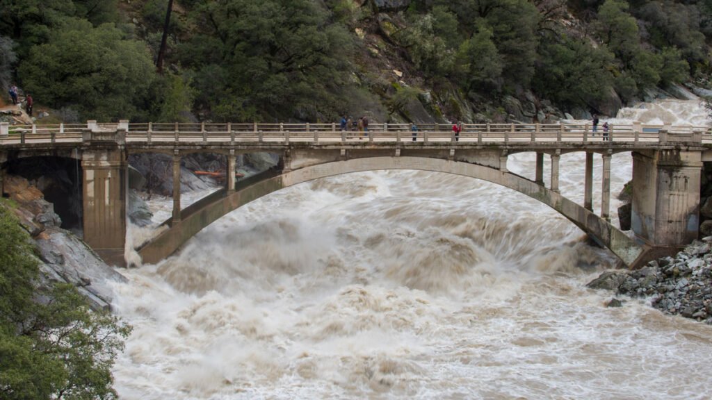 Keeping Humans in the Loop Improves Flood Forecasting