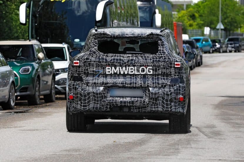 BMW iX5 M Caught With Blue Calipers and Aggressive M Intakes