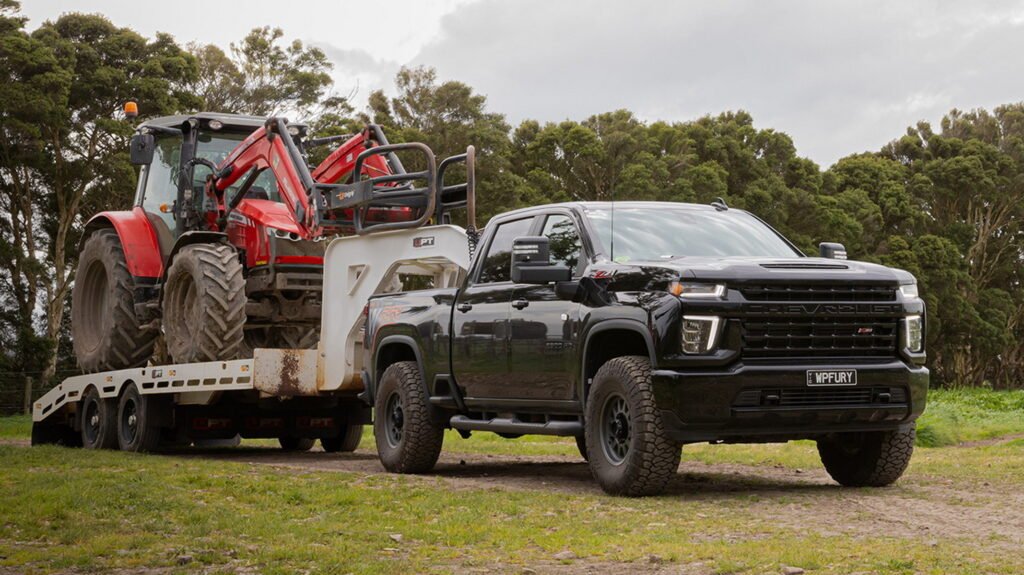 Chevy’s Silverado HD Gets A $13K Fifth-Wheel Hitch That Can Tow Three BYD Pickups