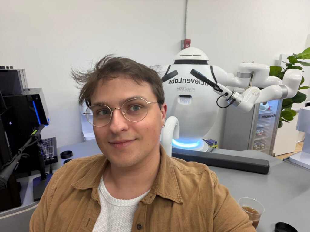 I went to ElevenLabs' NYC pop-up. A robot poured me cold brew before I haggled with an AI shopkeeper.