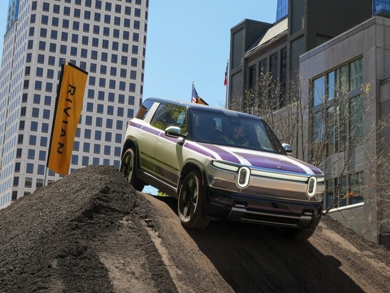 RJ Scaringe said there are 2 big reasons Rivian's new R2 doesn't look like a Tesla Model Y dupe