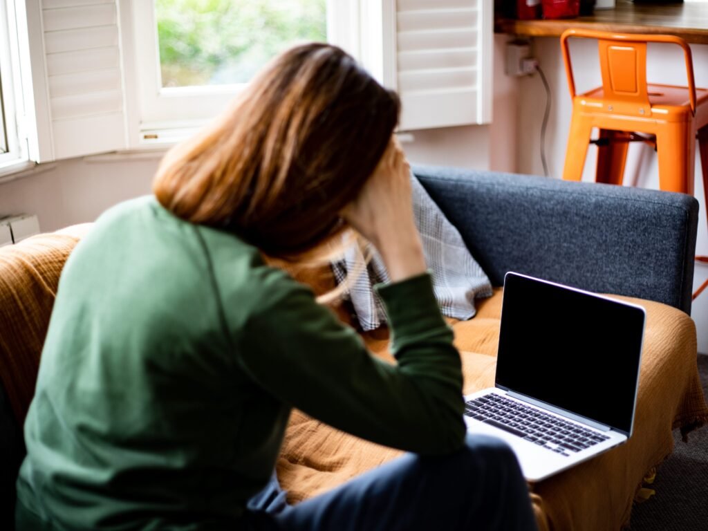 I was laid off at 56 and took a 60% pay cut to land my next role — the biggest thing I feel is anger