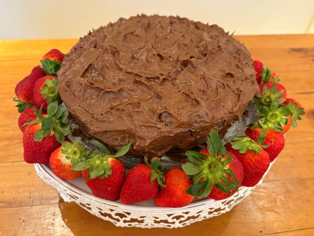 Whenever I host dinner parties, my friends beg me to make Joanna Gaines' decadent chocolate-cola cake