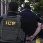DOJ sues Milwaukee over mask ban for federal agents