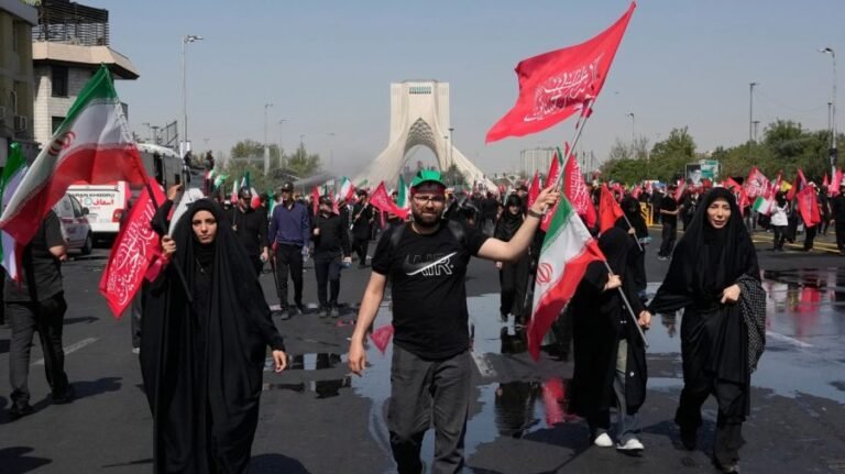 Mourners flood Iran capital for Khamenei funeral procession