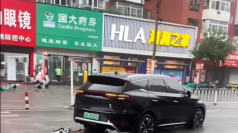 BYD SUV Keeps Driving After Floodwater Rips Its Rear Motor Loose