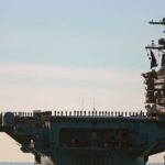 Aircraft carrier arrives in Middle East to relieve USS Abraham Lincoln after lengthy deployment