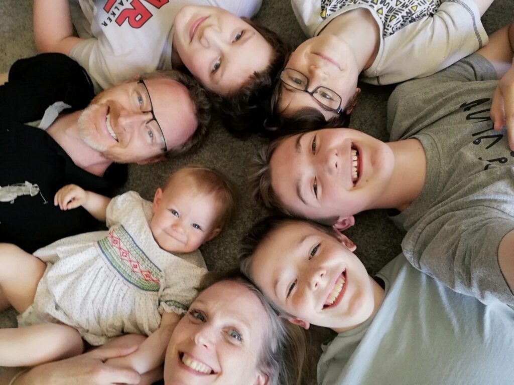 My partner and I had 4 boys between us. Our surprise daughter brought our blended families together.