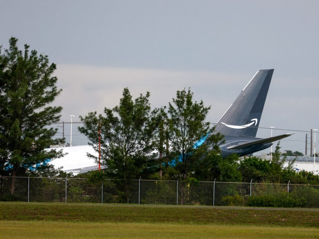 An Amazon Prime cargo plane crashed after it overran a runway at Miami International Airport, officials say