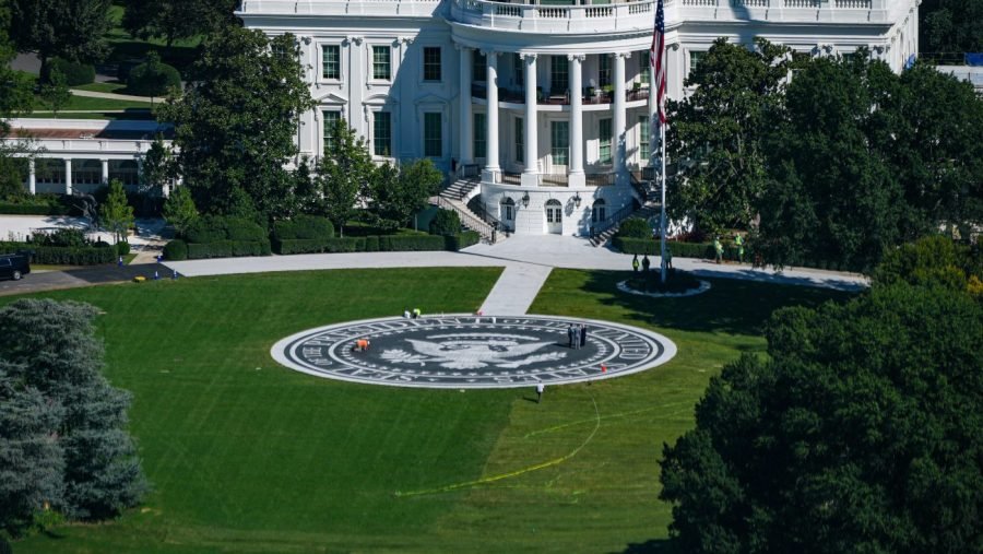 Trump inaudible at helipad ribbon cutting amid press pool fight 