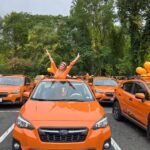 The Annual Sunshine Orange Subaru Crosstrek Parade Is Exactly Why The World Needs More Colorful Cars