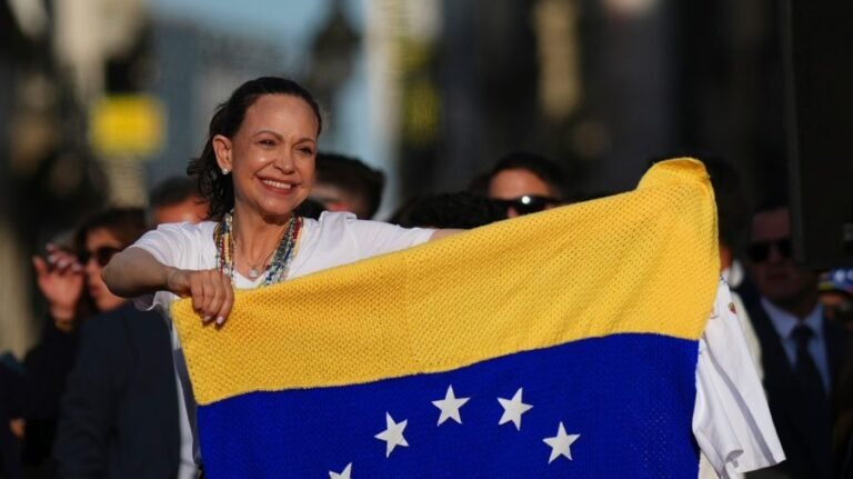 Machado returns to Venezuela after 10 months of exile