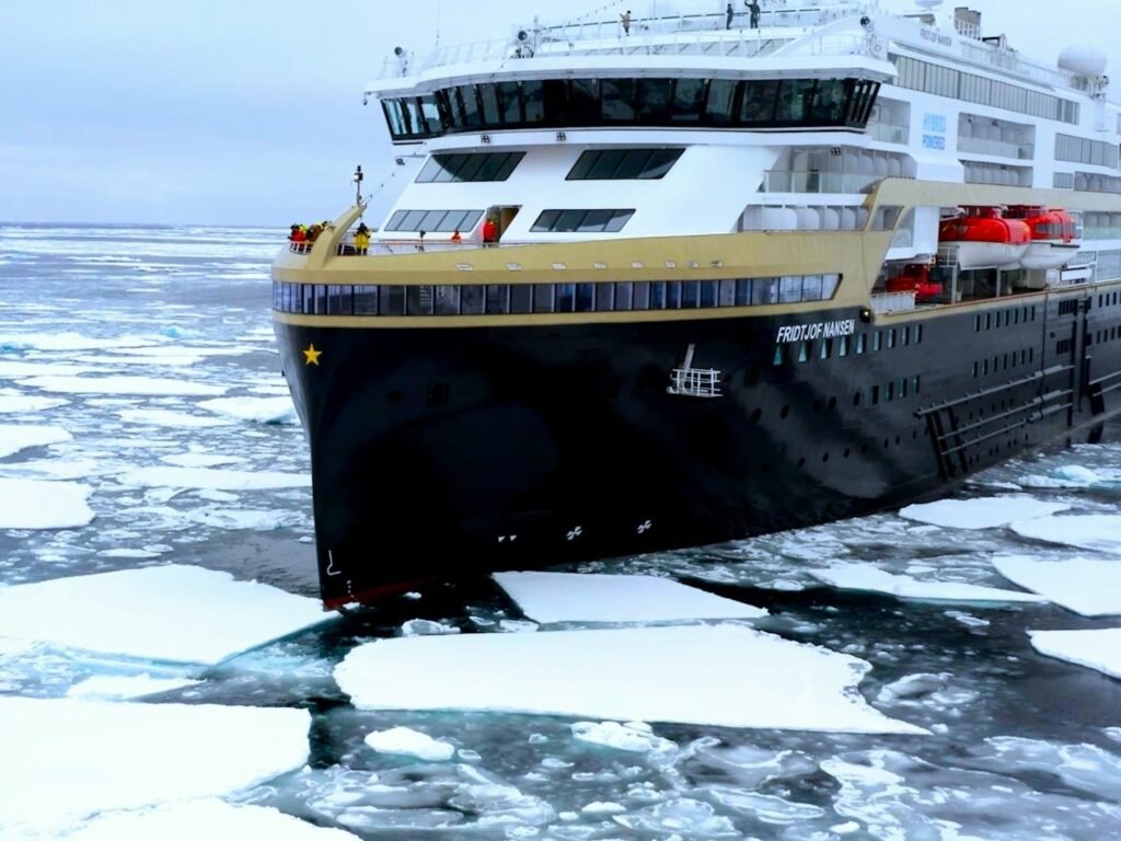 How a cruise ship navigates Greenland's icebergs and extreme Arctic conditions