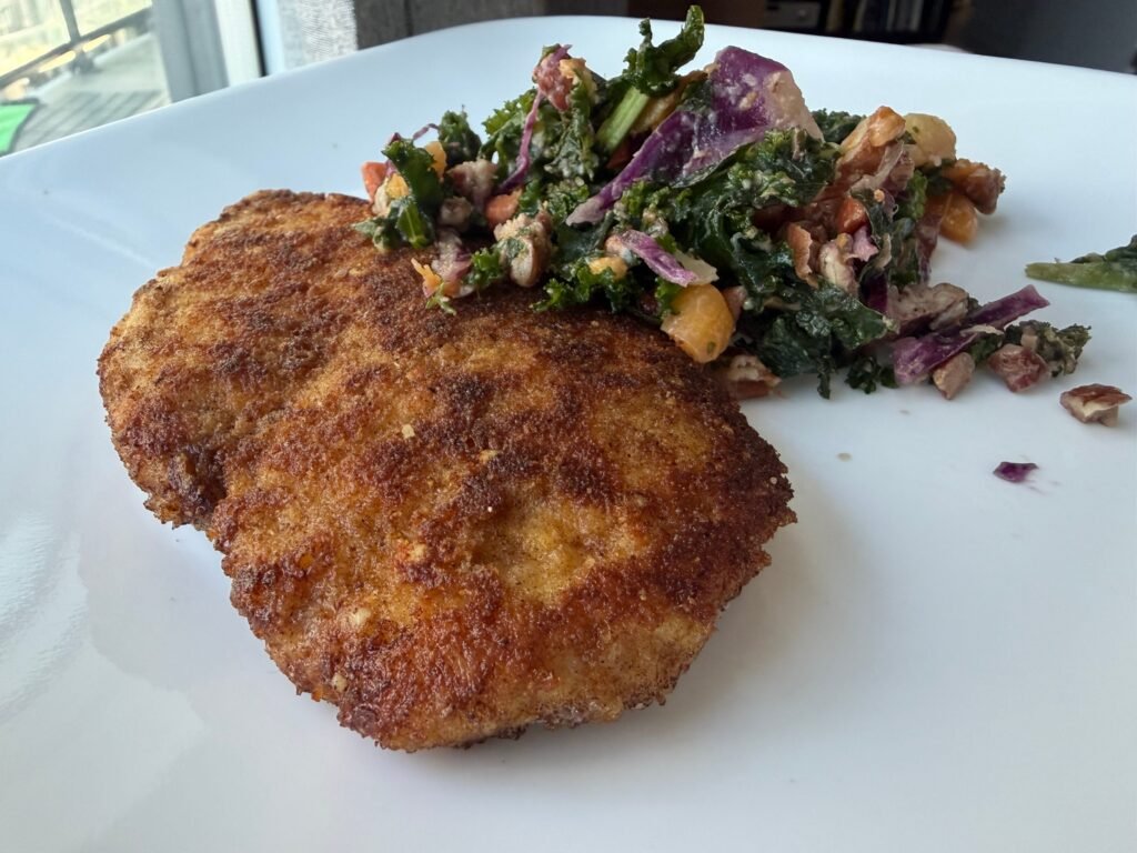 I swear by Ina Garten's 20-minute Parmesan chicken. It's my go-to weeknight dinner that requires only a few ingredients.