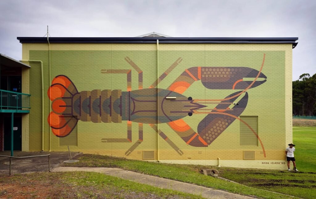 Amok Island’s Geometric Murals Teem with Vibrant Local Flora and Fauna